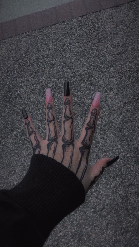 Skeleton Hand Tattoos 22