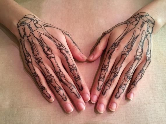 Skeleton Hand Tattoos 42