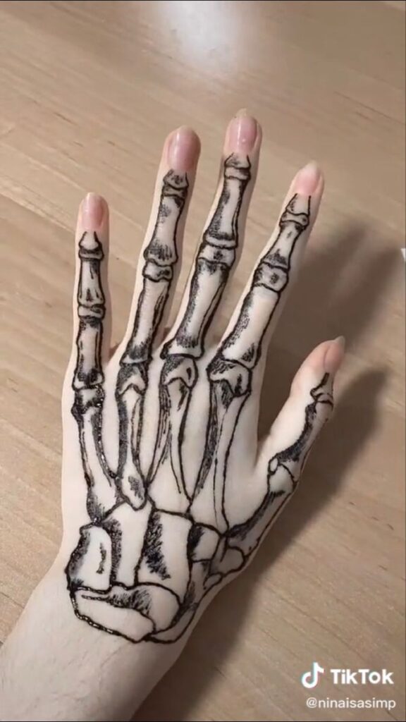 Skeleton Hand Tattoos 44