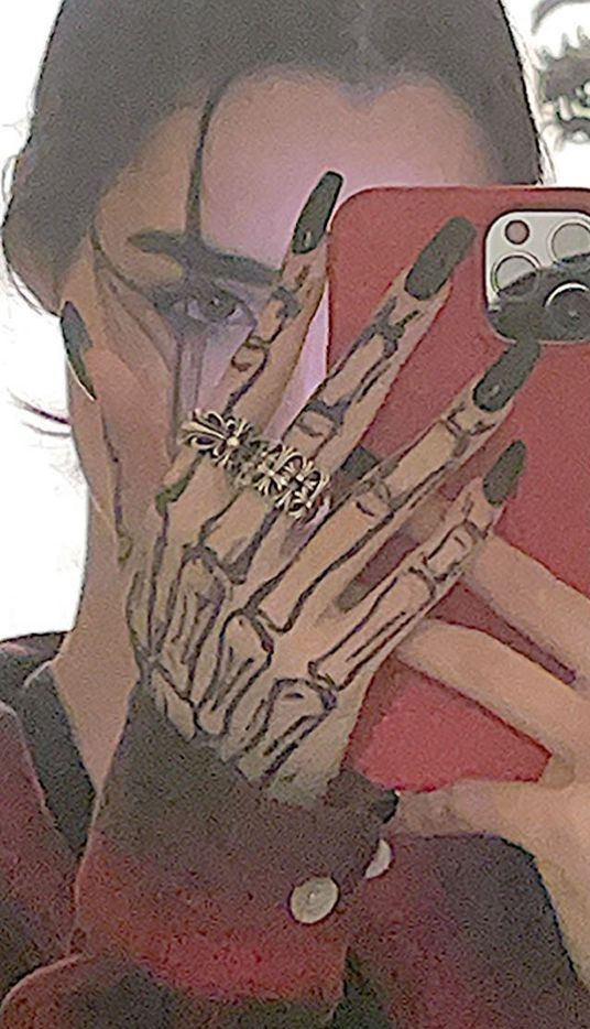 Skeleton Hand Tattoos 51