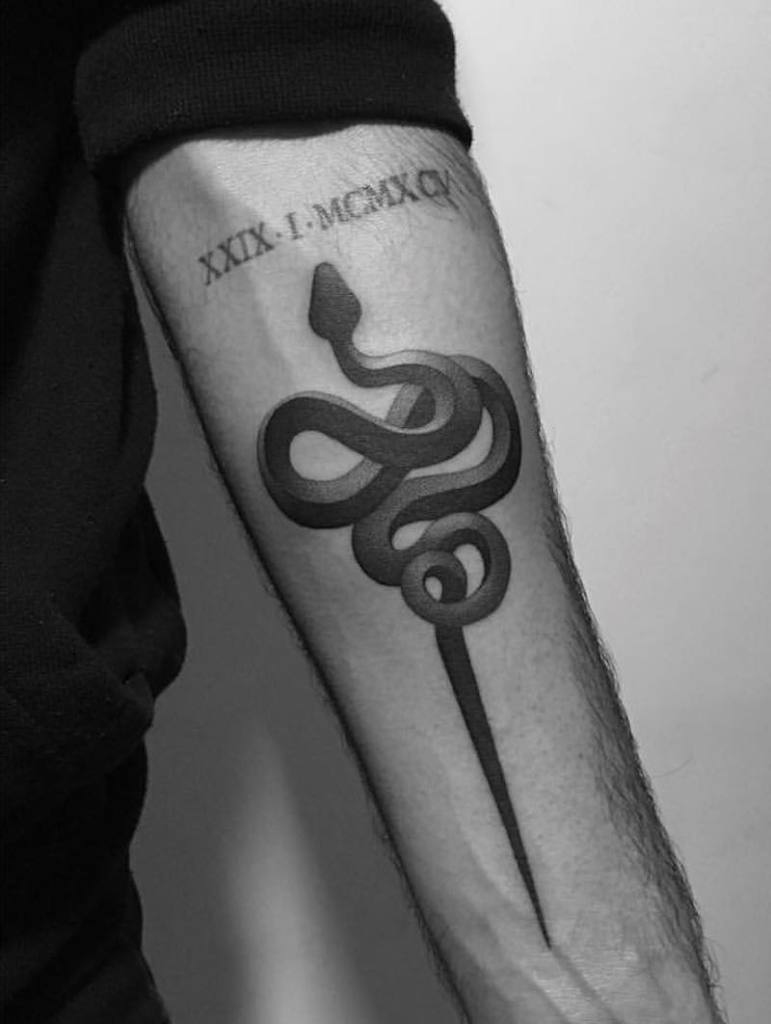 Tatuaje de Ouroboros del siglo XIX.