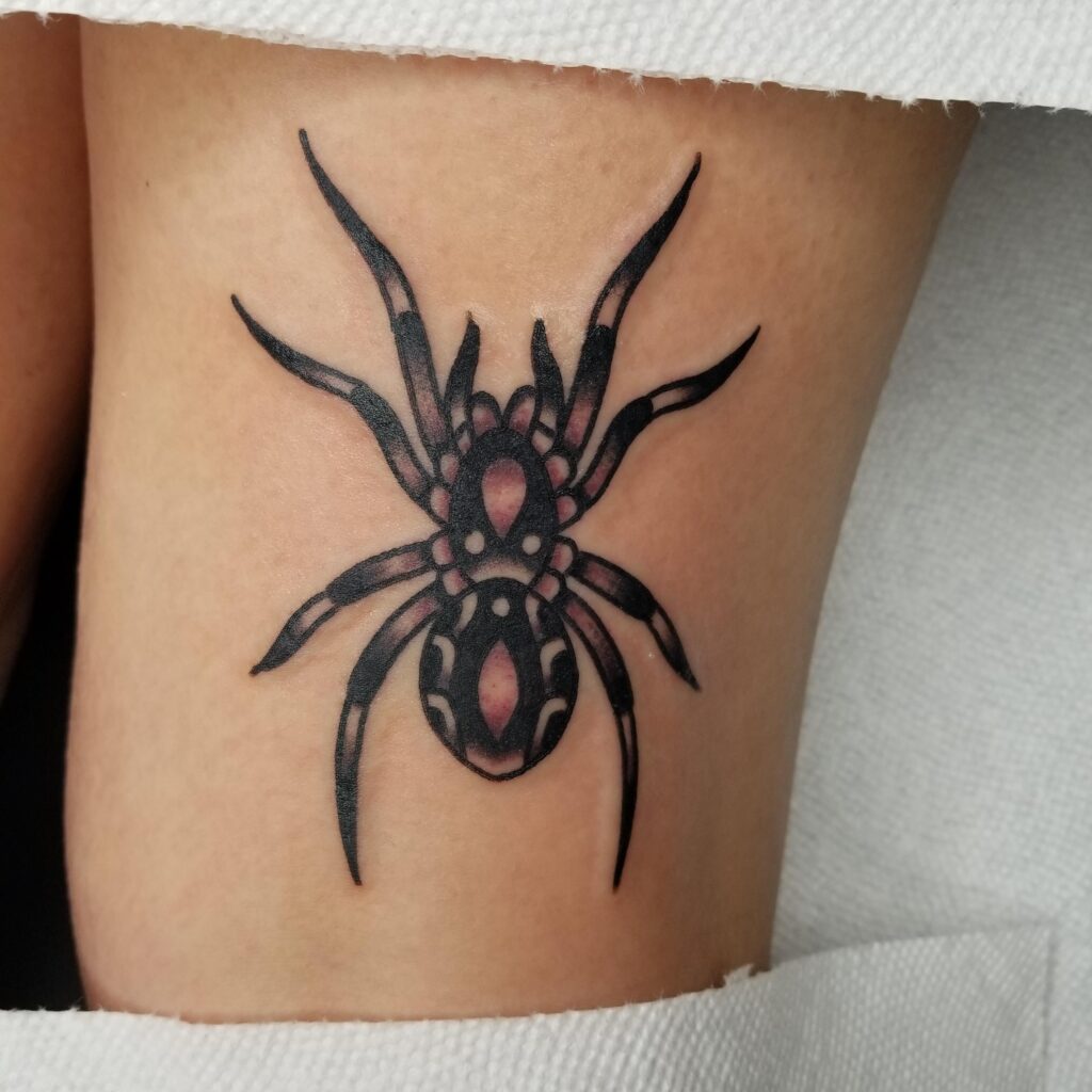 heart tattoo with black widow spiderTikTok Search