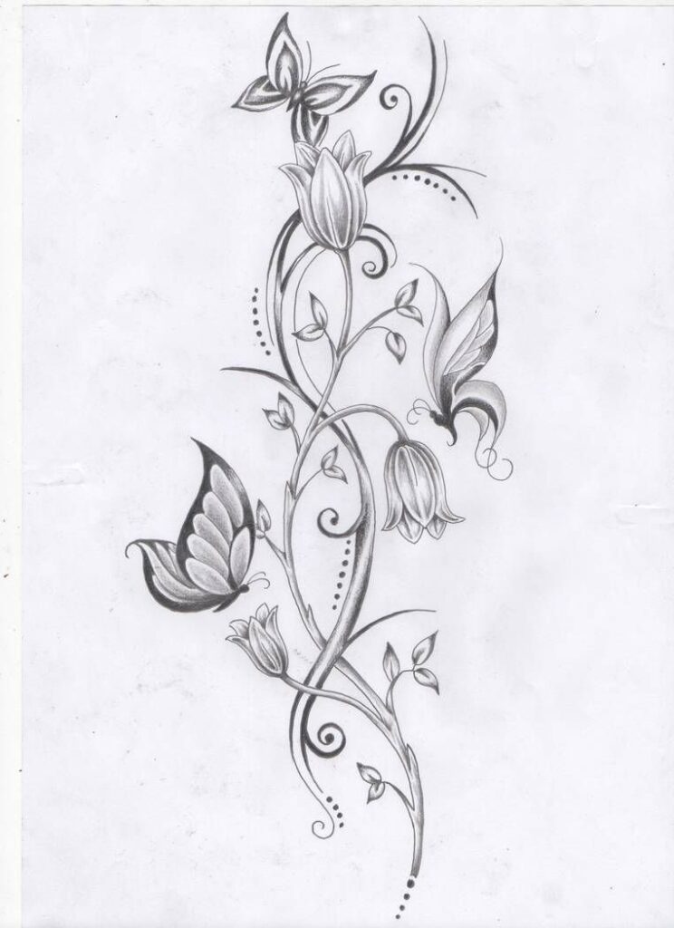 rose vine tattoo designs on the leg