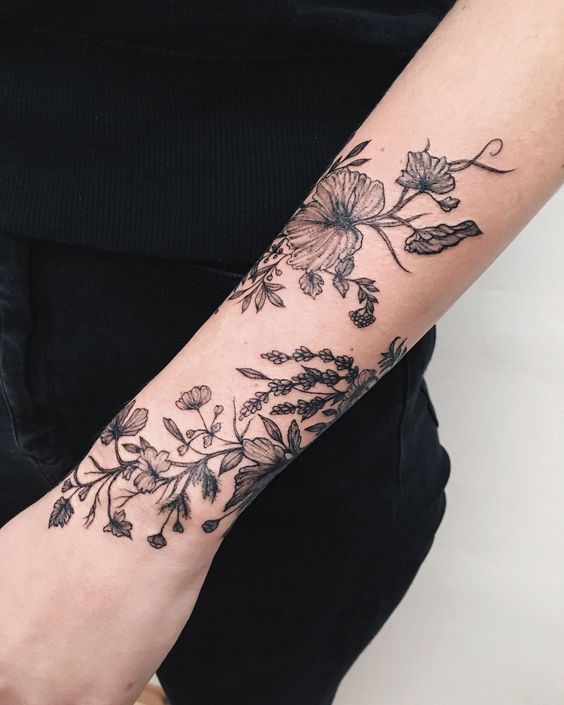 rose vine tattoos on arm