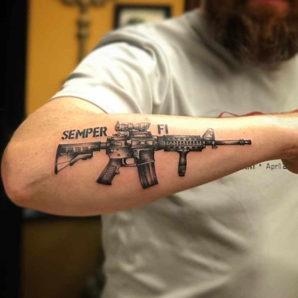 Tatuaje de pistola 177