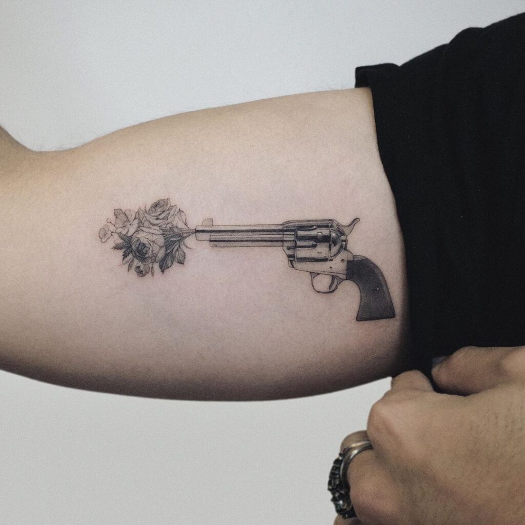 tatuaje de pistola 187