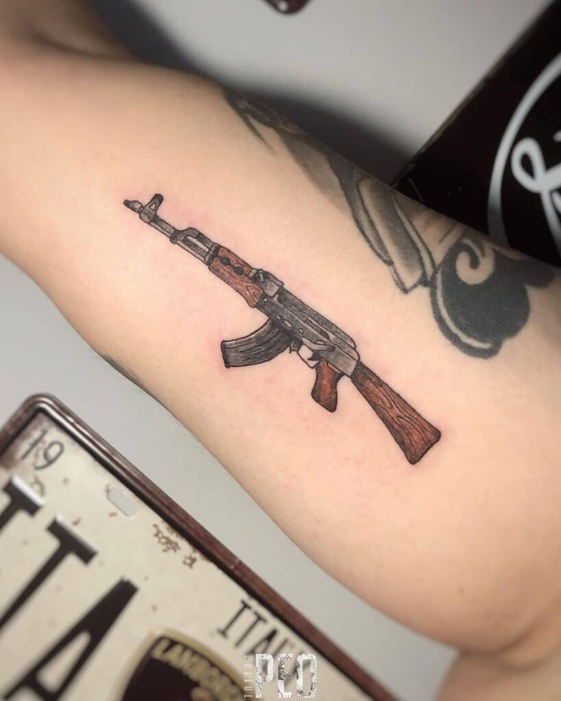 tatuaje de pistola 41