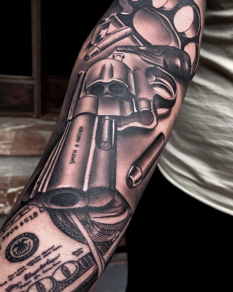 tatuaje de pistola 61