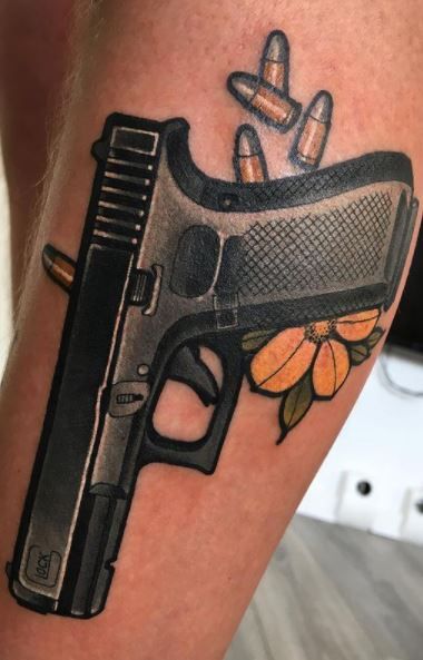 tatuaje de pistola 97
