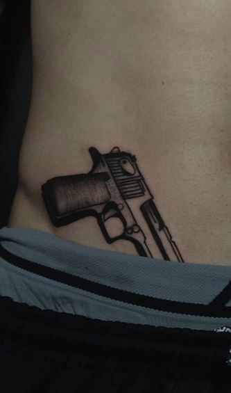 tatuaje de pistola 98
