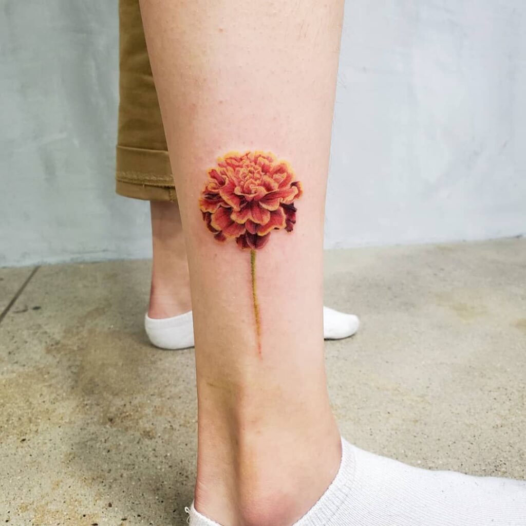 Tatuaje de caléndula 138
