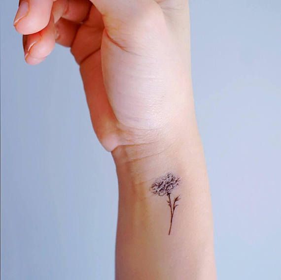 Tatuaje de caléndula 159